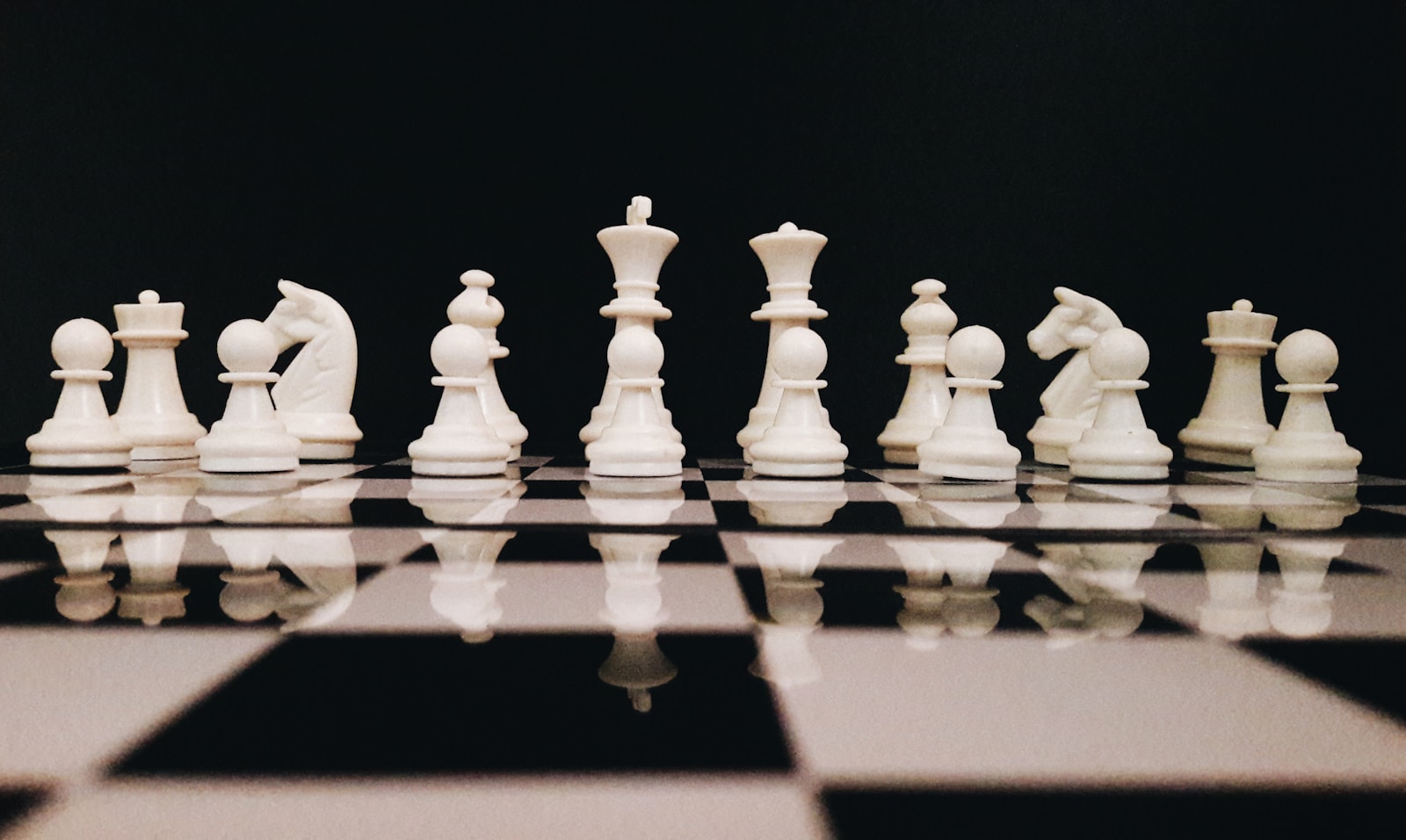 Photo by sk white chess game set