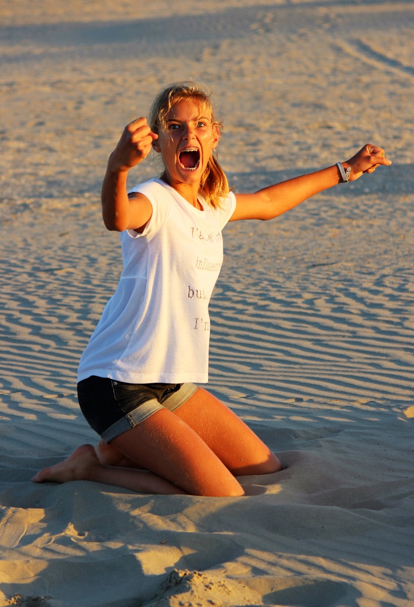 Photo by sandra lansue a woman on a beach